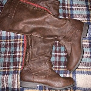 Knee high boots with western style accents